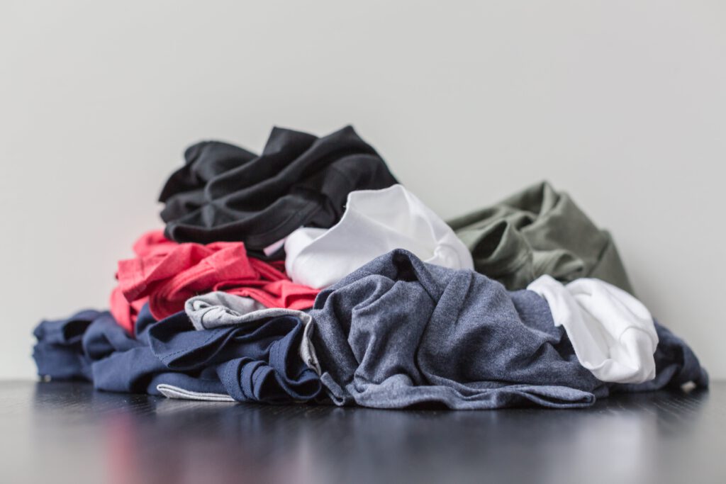 Pile of t-shirts, dirty laundry.

More:

 View public domain image source here
